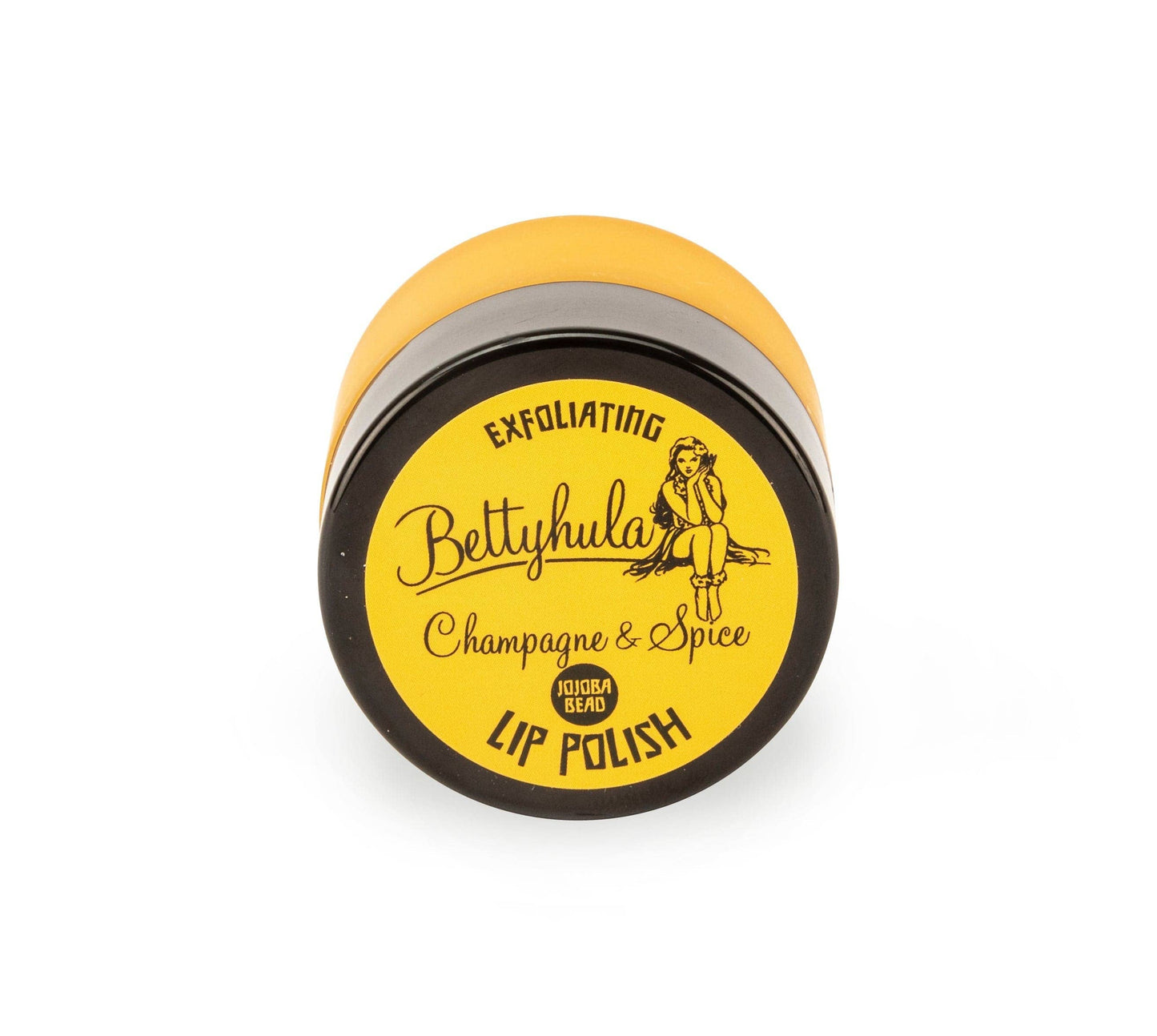 • Exfoliating lip polish. Champagne & Spice